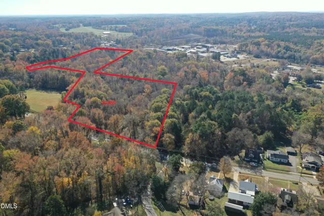 an aerial view of residential house and outdoor space