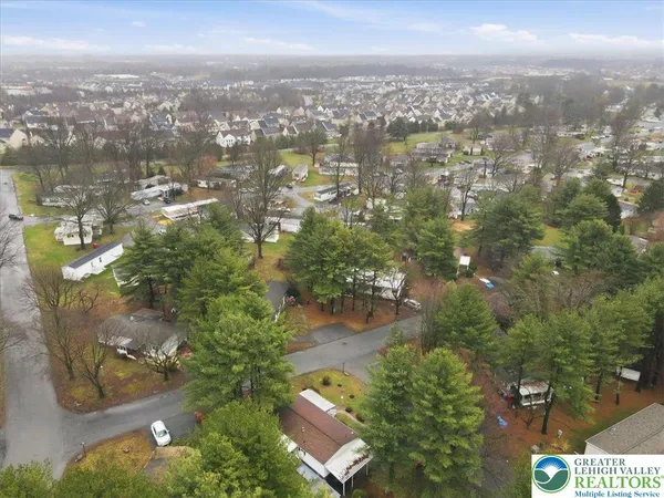 an aerial view of residential building with outdoor space