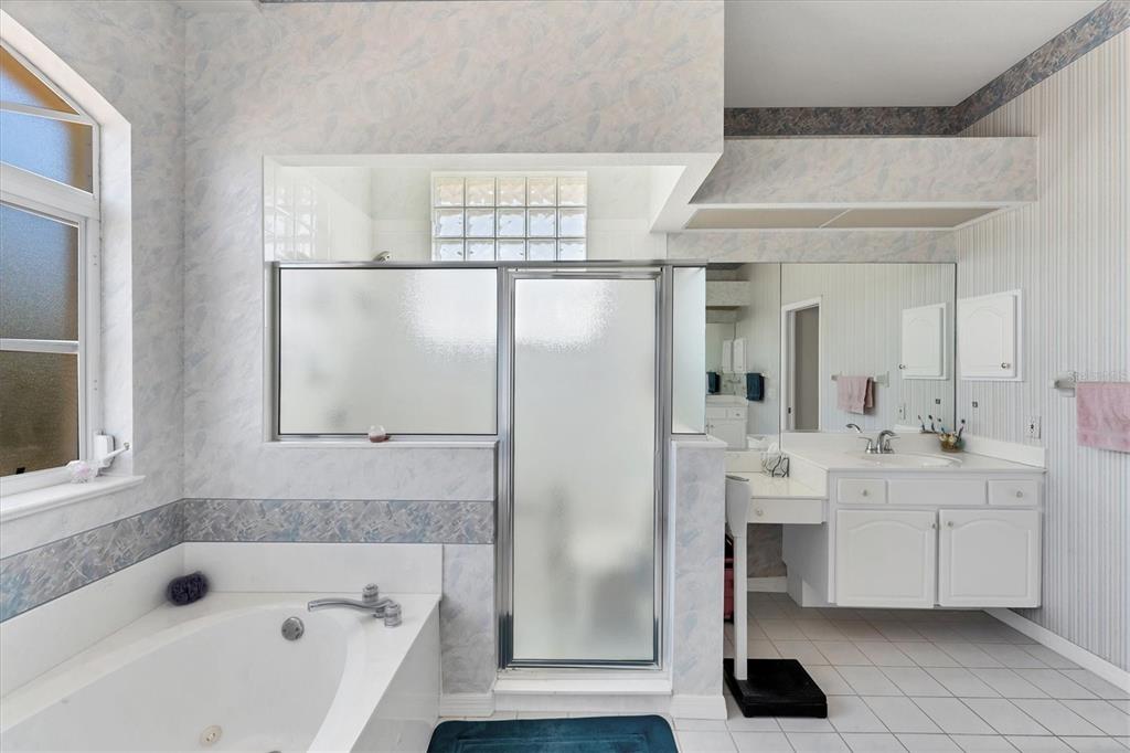 285 Spaniards Road Placida, FL 33946 - Photo 20 of 61 a bathroom with a bathtub and a sink