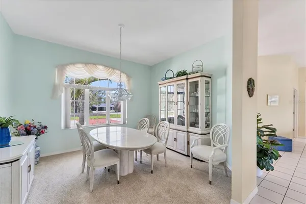a spacious bedroom with a bed and a couch