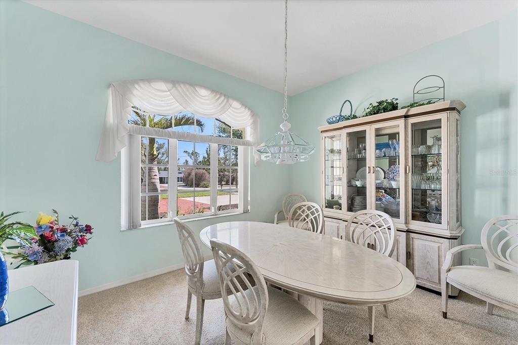 285 Spaniards Road Placida, FL 33946 - Photo 31 of 61 a view of a dining room with furniture window and outside view