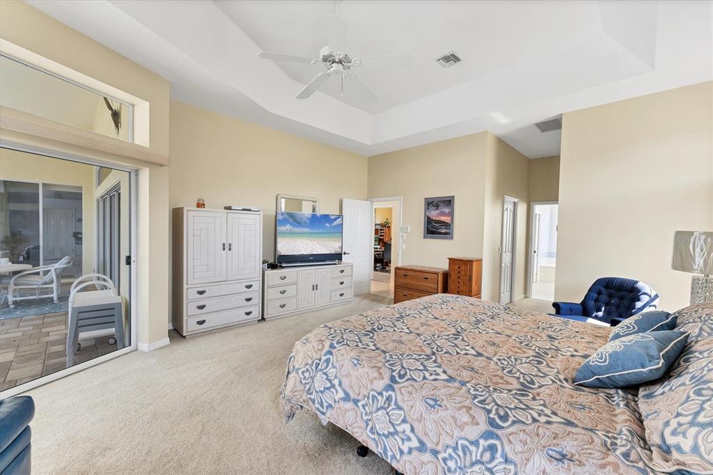 285 Spaniards Road Placida, FL 33946 - Photo 39 of 61 a bedroom with a bed and cabinets