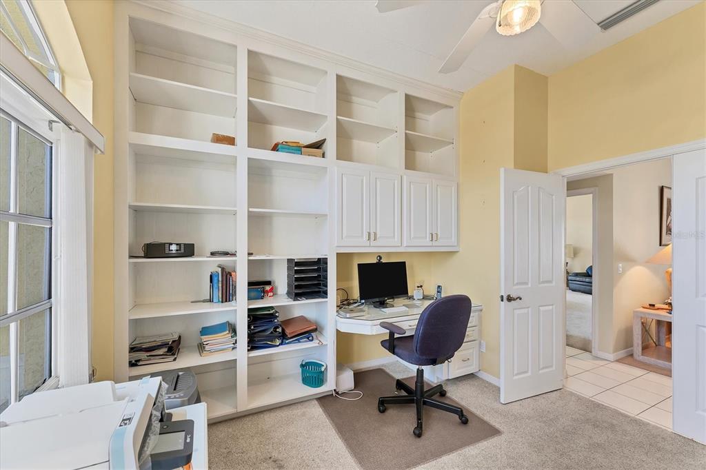 285 Spaniards Road Placida, FL 33946 - Photo 46 of 61 a view of a workspace with furniture and a window