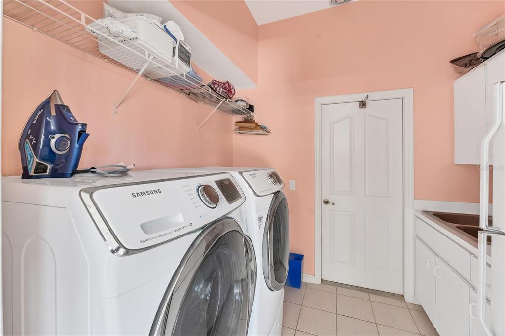 285 Spaniards Road Placida, FL 33946 - Photo 48 of 61 a utility room with dryer and washer