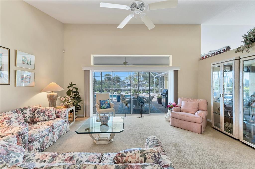 285 Spaniards Road Placida, FL 33946 - Photo 7 of 61 a living room with furniture and a large window