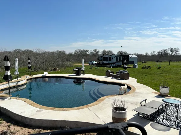 a view of swimming pool and lake view