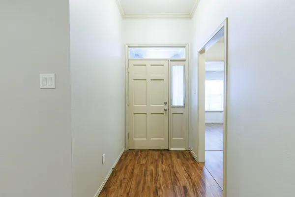 a view of a room with wooden floor sink and closet