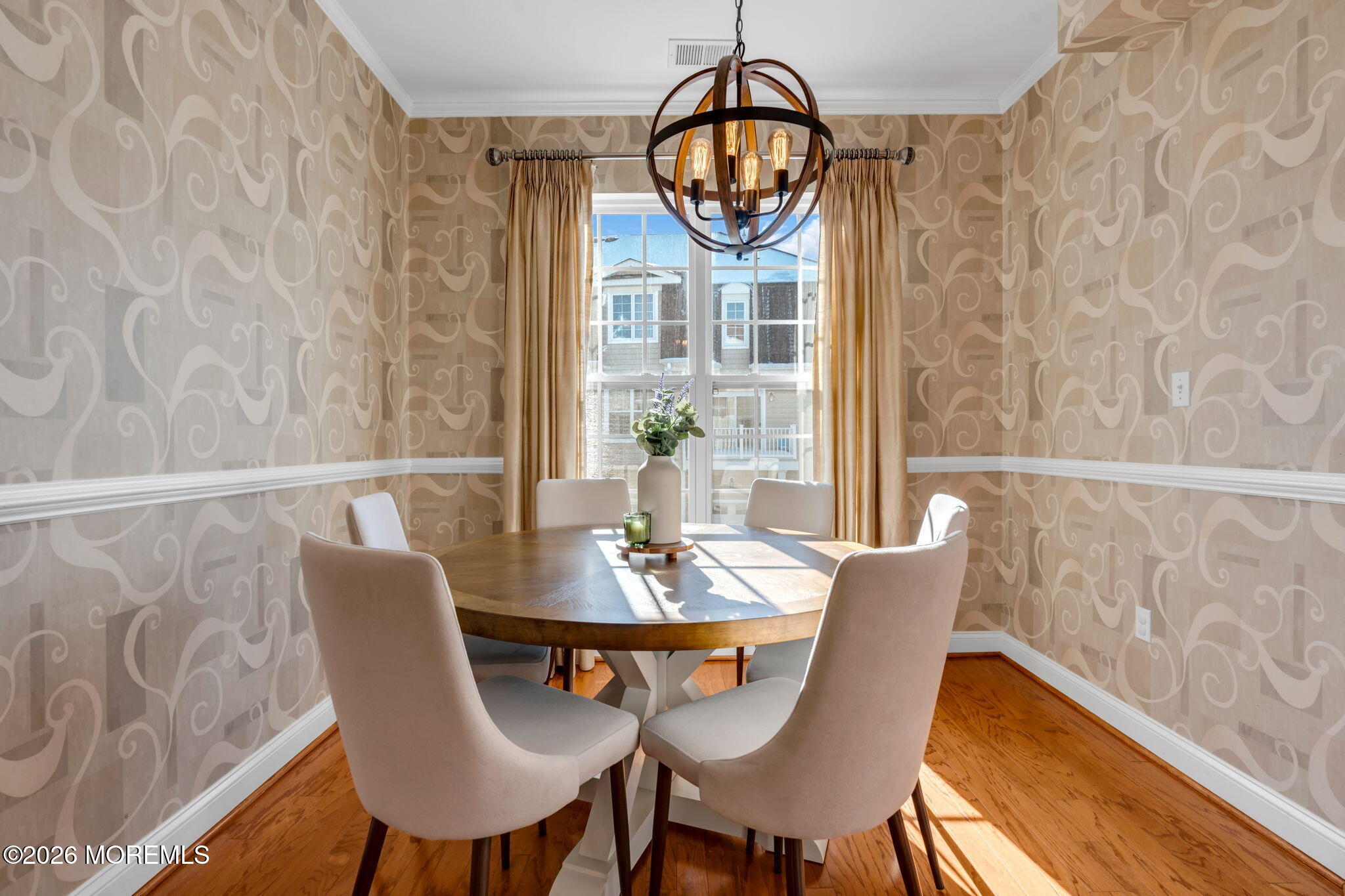 712 Abby Road Middletown, NJ 07748 - Photo 13 of 44 a view of a dining room with furniture window and wooden floor