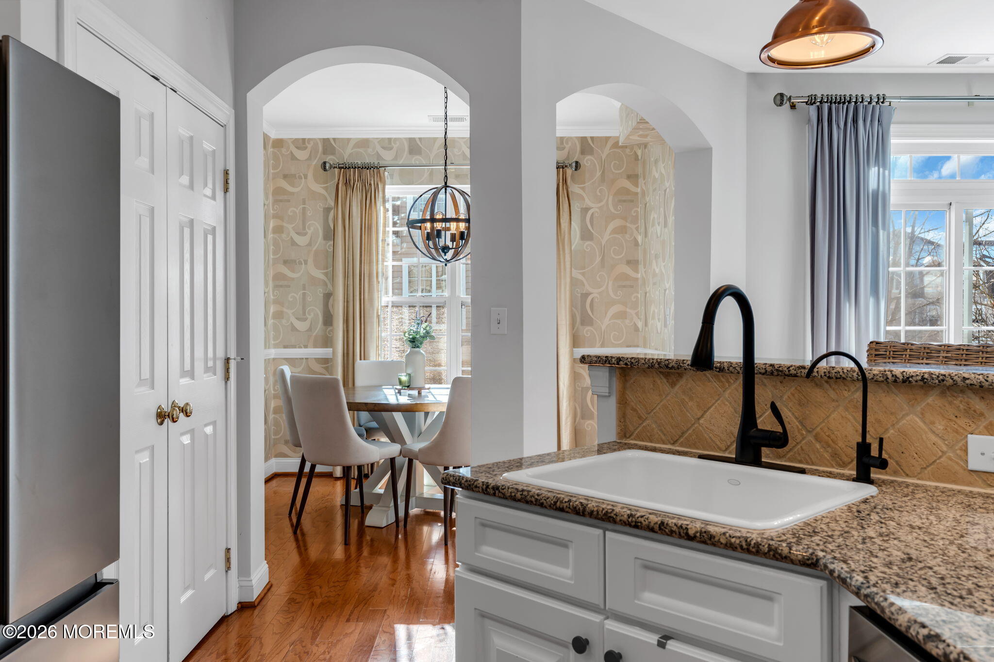 712 Abby Road Middletown, NJ 07748 - Photo 19 of 44 a en suite bathroom with a granite countertop sink and a window