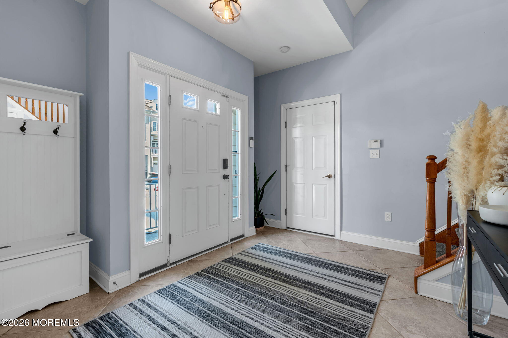 712 Abby Road Middletown, NJ 07748 - Photo 2 of 44 a view of a bedroom with wooden floor and a bathroom