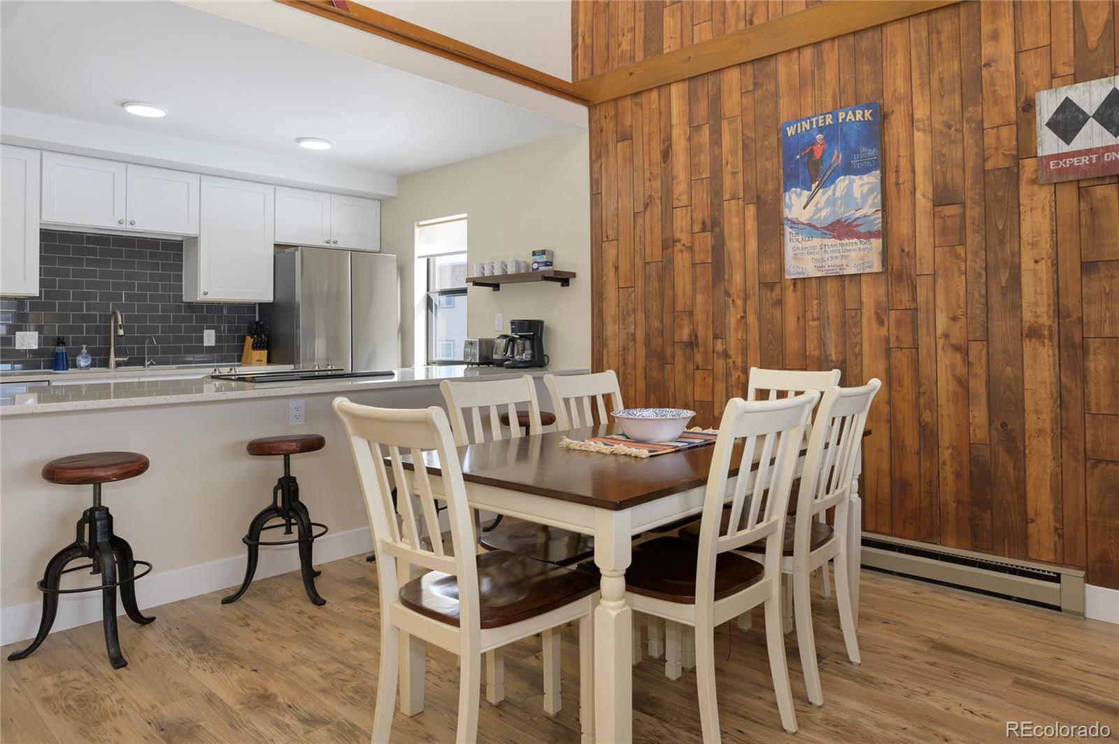 83 County Road, Unit F7 Fraser, CO 80442 - Photo 5 of 20 a dining room with furniture and window