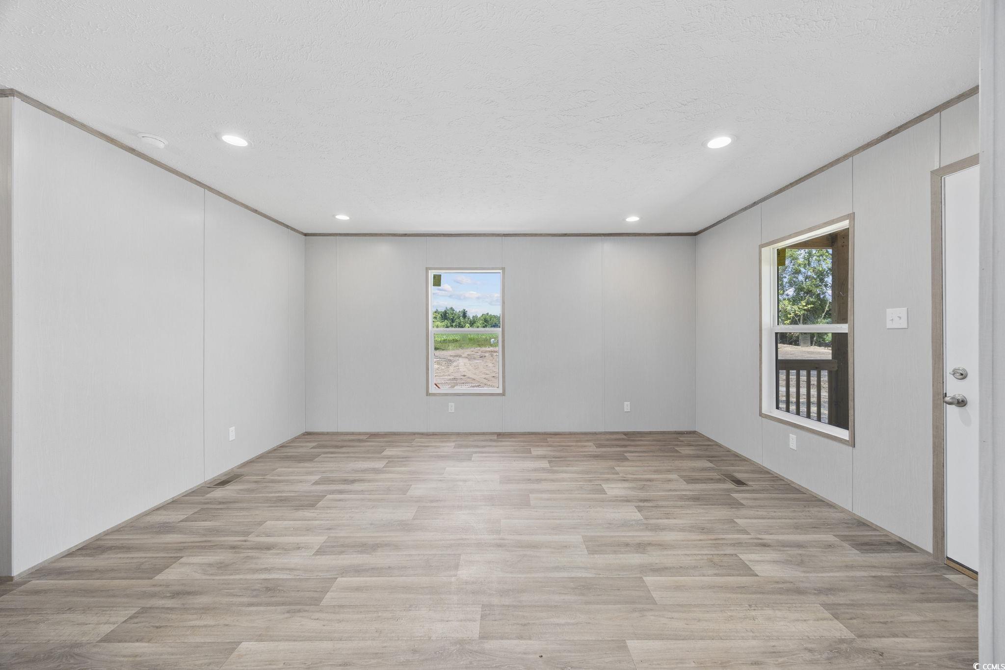 491 North Green Sea Road Loris, SC 29569 - Photo 30 of 39 Empty room featuring light wood-style flooring, re