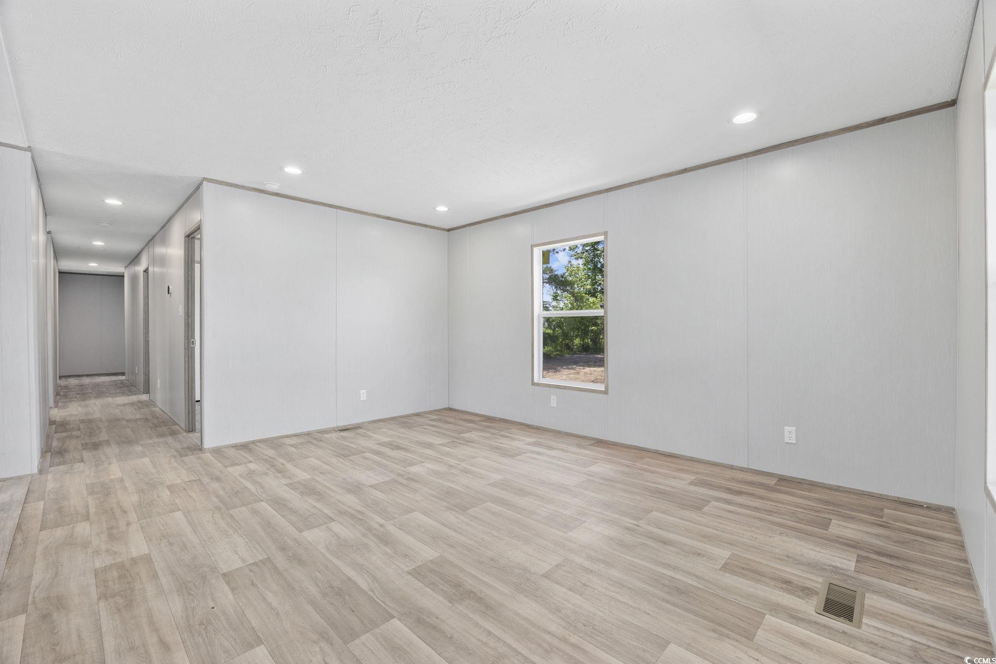 491 North Green Sea Road Loris, SC 29569 - Photo 34 of 39 Empty room with recessed lighting and light wood-s