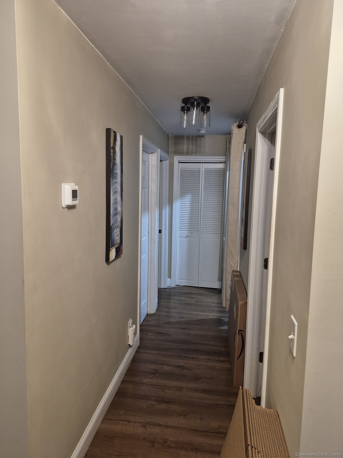34 Transylvania Road Woodbury, CT 06798 - Photo 15 of 17 a view of a hallway with wooden floor