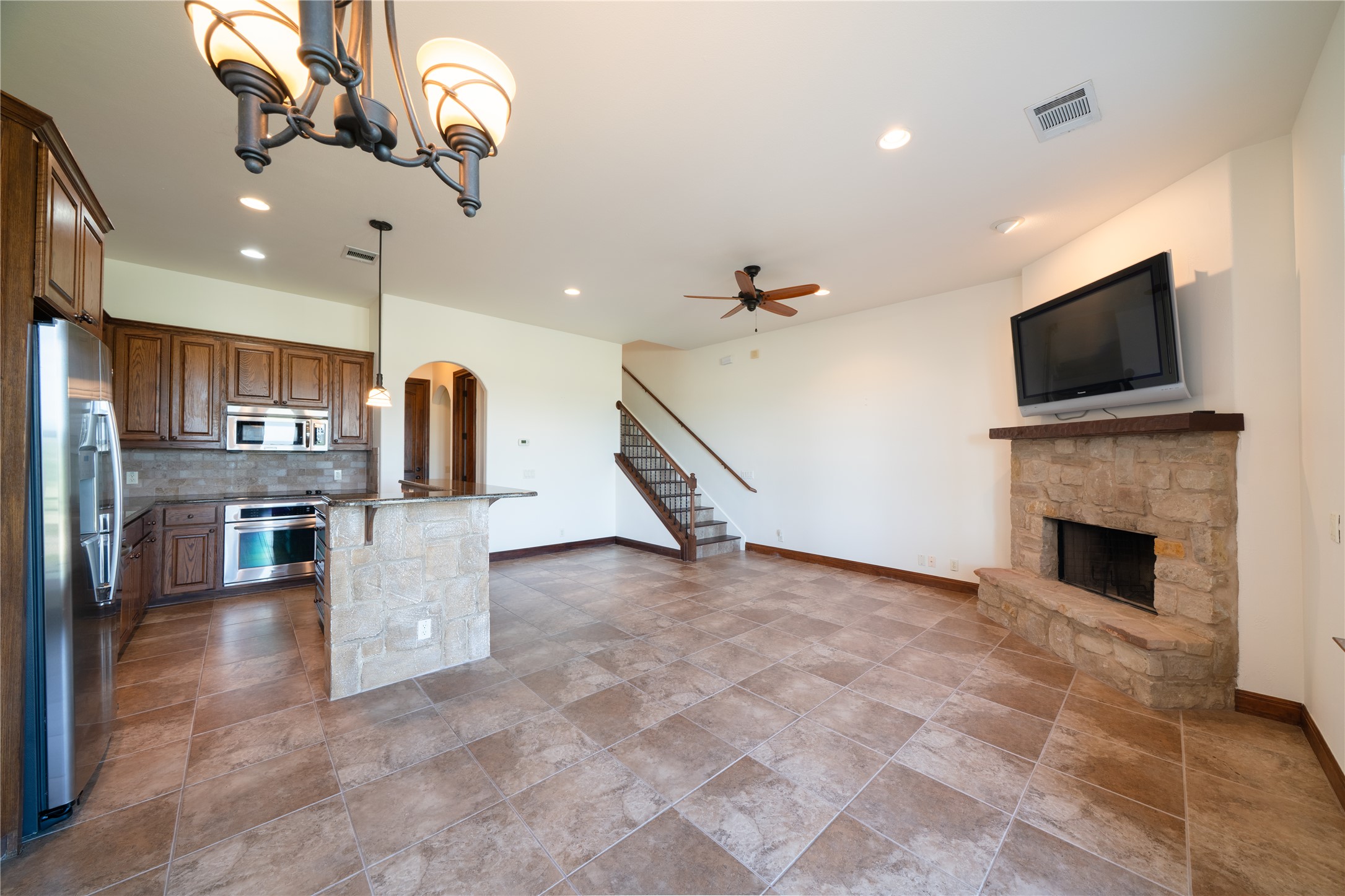17545 West Reed Park Road, Unit 2 Jonestown, TX 78645 - Photo 8 of 39 a view of kitchen and microwave