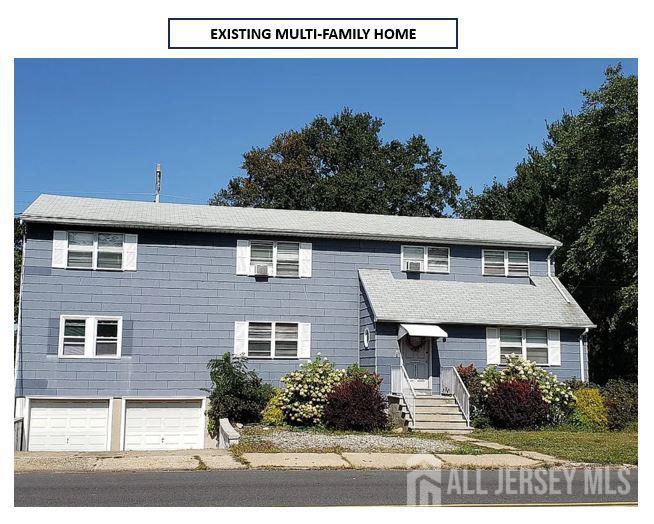 271 Central Avenue Edison, NJ 08817 - Photo 24 of 25 a front view of a house with a yard