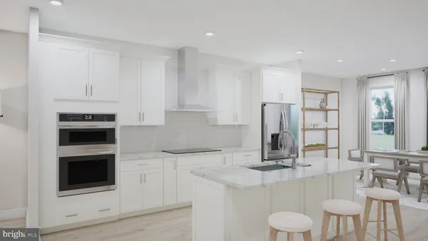 a bathroom with a granite countertop sink mirror and double