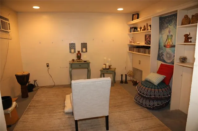 a room with furniture and a window