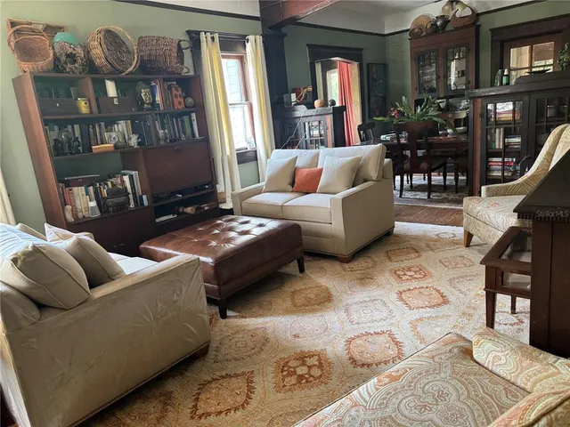 a view of a livingroom with furniture and window