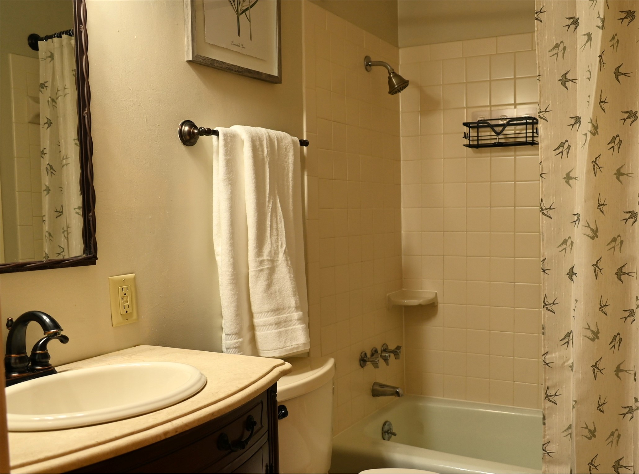 500 East Riverside Drive, Unit 224 Austin, TX 78704 - Photo 19 of 19 A well-appointed bath with a practical vanity and shower-tub combination awaits.