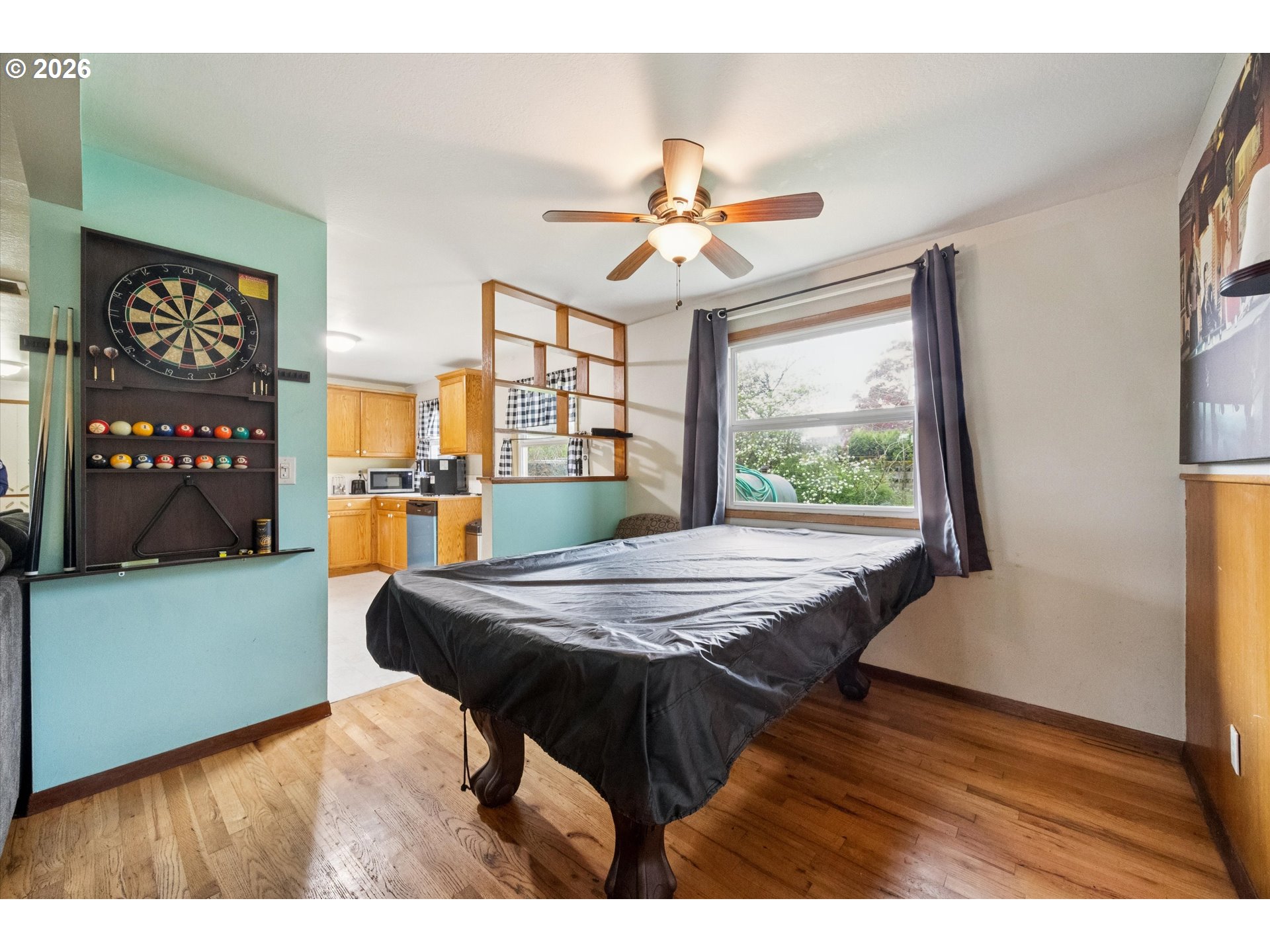 2202 Southeast 178th Place Portland, OR 97233 - Photo 14 of 30 a view of a dining room with furniture window and wooden floor