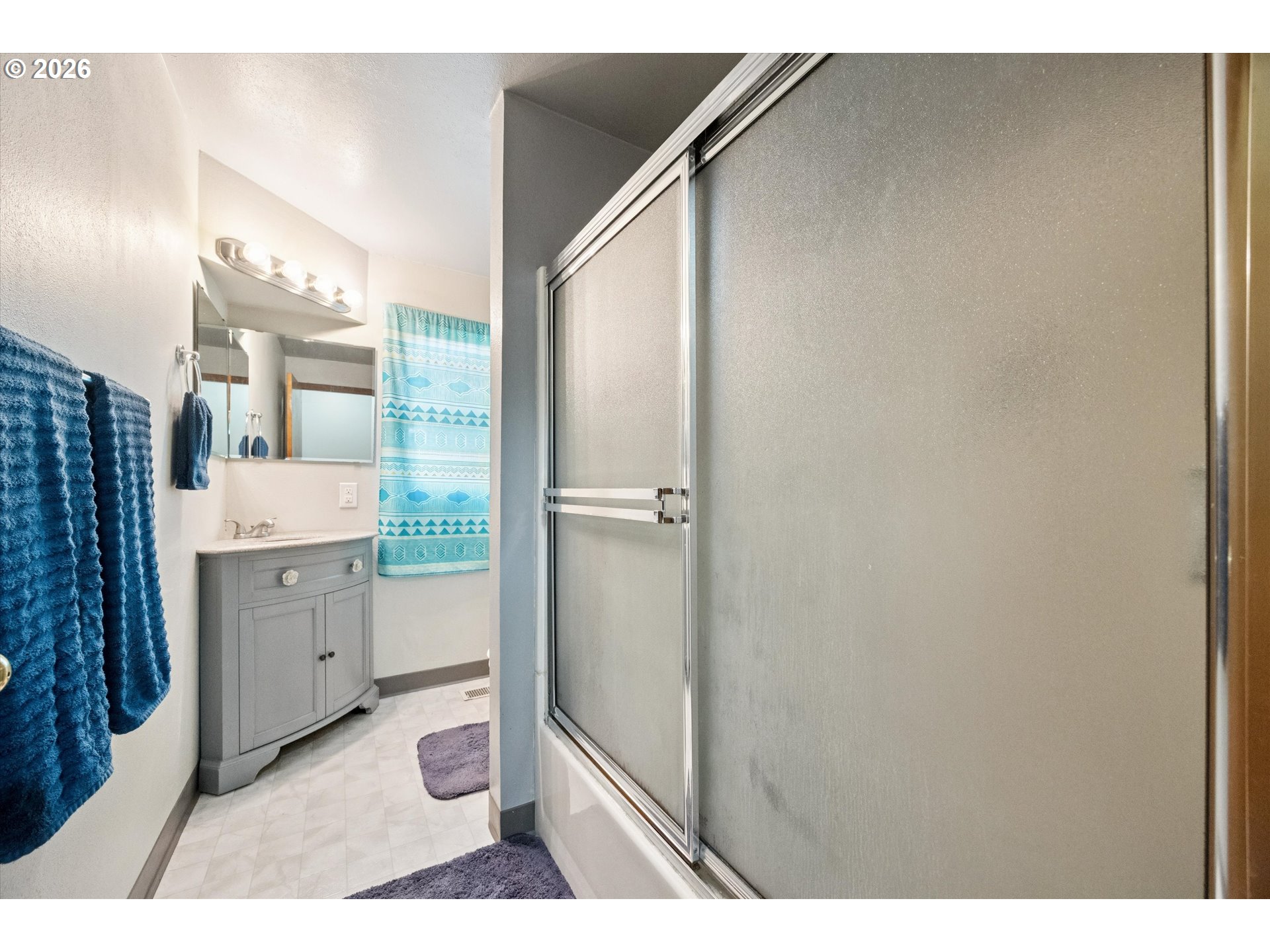 2202 Southeast 178th Place Portland, OR 97233 - Photo 17 of 30 a bathroom with a sink toilet and shower