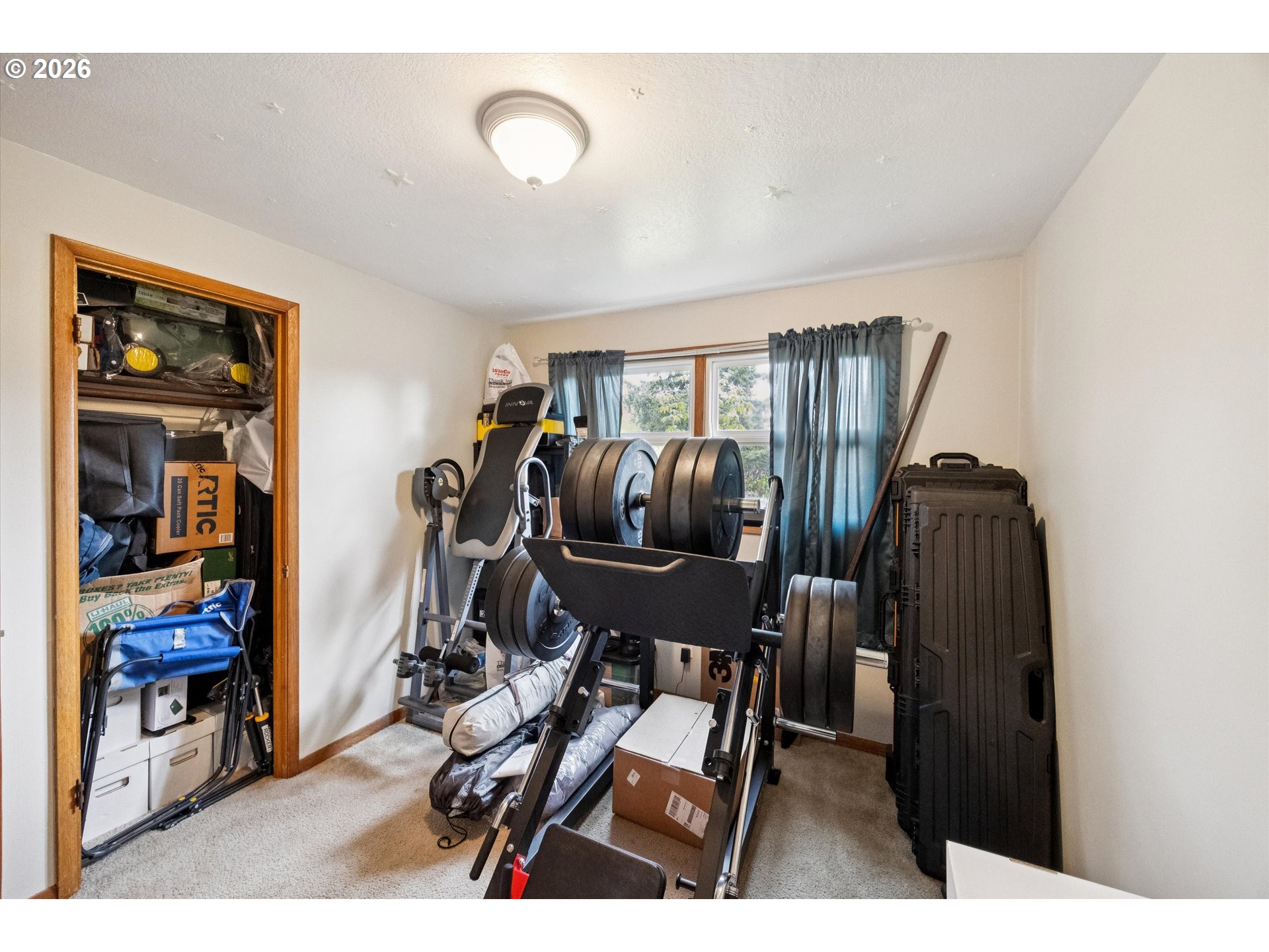 2202 Southeast 178th Place Portland, OR 97233 - Photo 20 of 30 a room with furniture and musical instruments