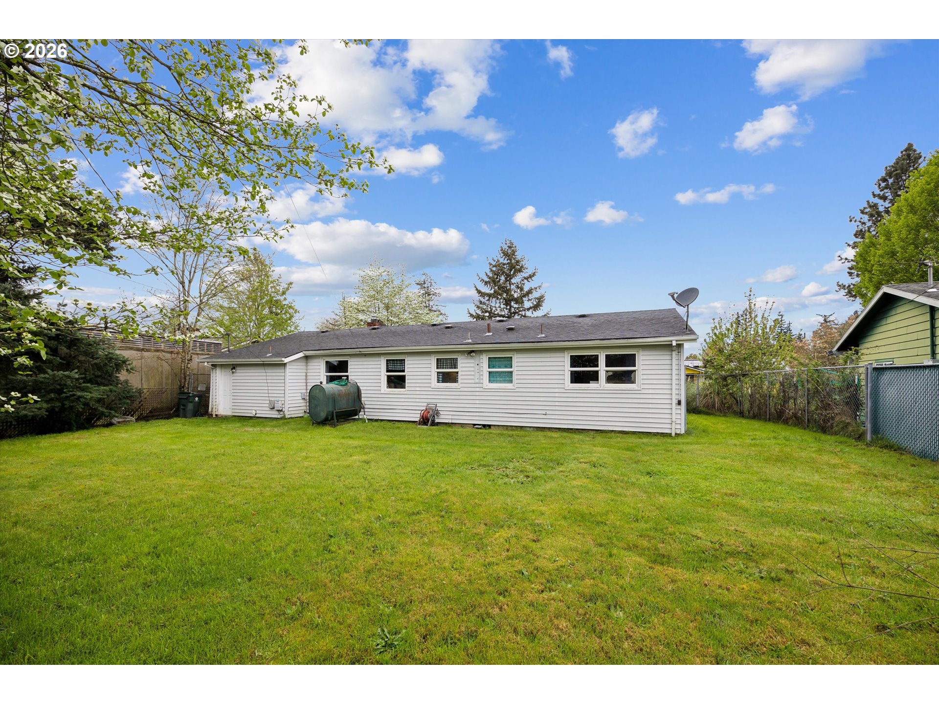 2202 Southeast 178th Place Portland, OR 97233 - Photo 25 of 30 a view of a house with a big yard