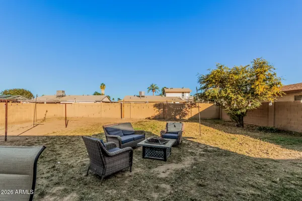 a view of a terrace with chairs