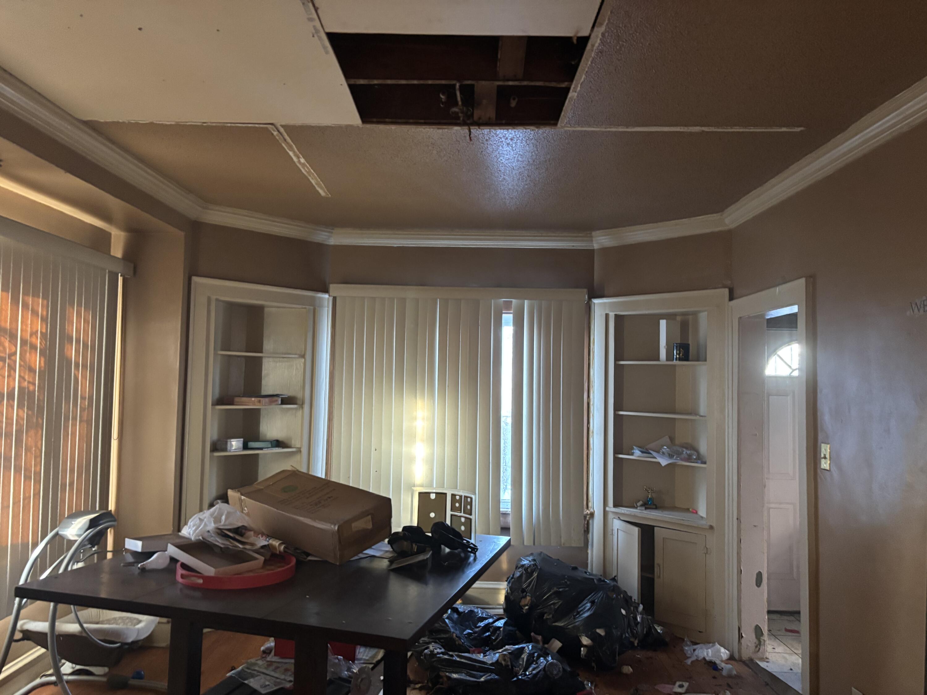 740 Hayes Street Gary, IN 46404 - Photo 3 of 3 a room with furniture and window