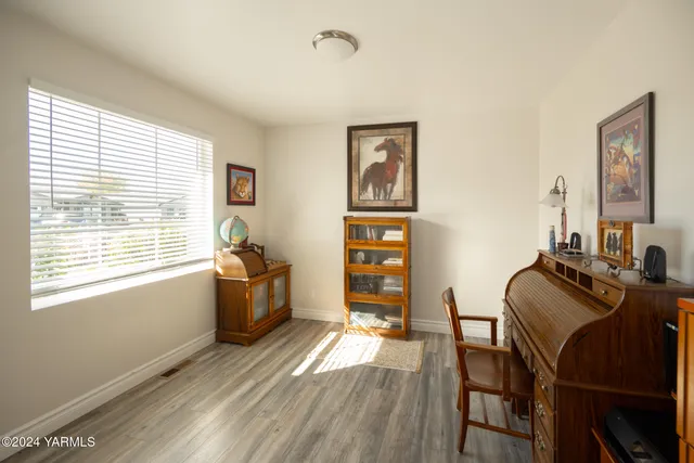 a room with furniture and a window