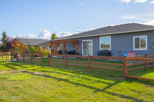 a view of house with outdoor space and porch