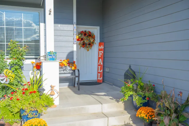 a view of a entryway with flower pots