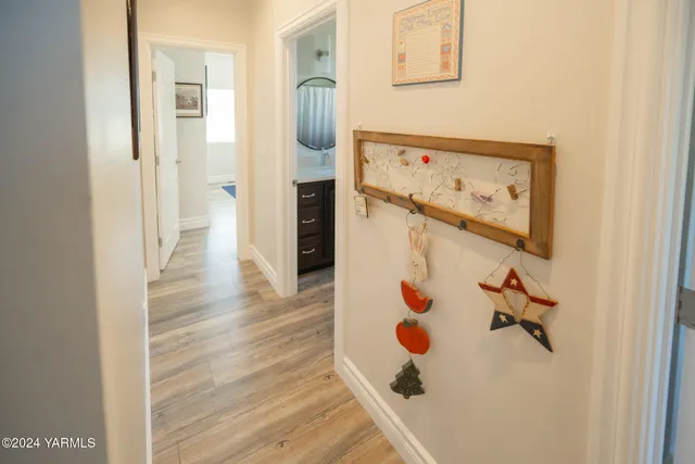 a bathroom with a tub and shower curtain