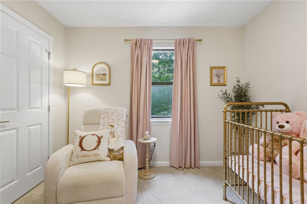 404 Brooks Street Dallas, GA 30157 - Photo 22 of 38 a living room with furniture and a window