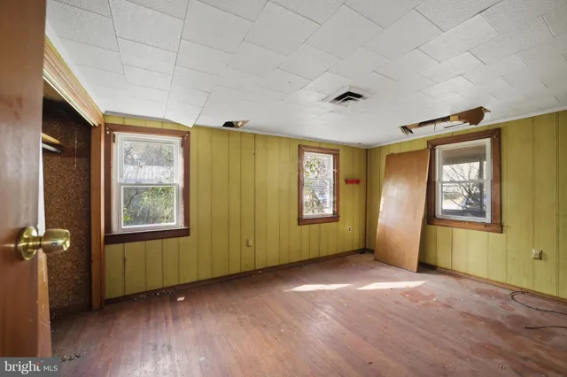 an empty room with windows