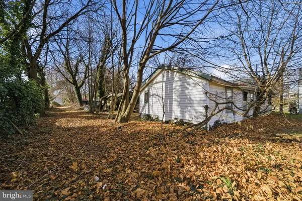 a aerial view of a house with a yard