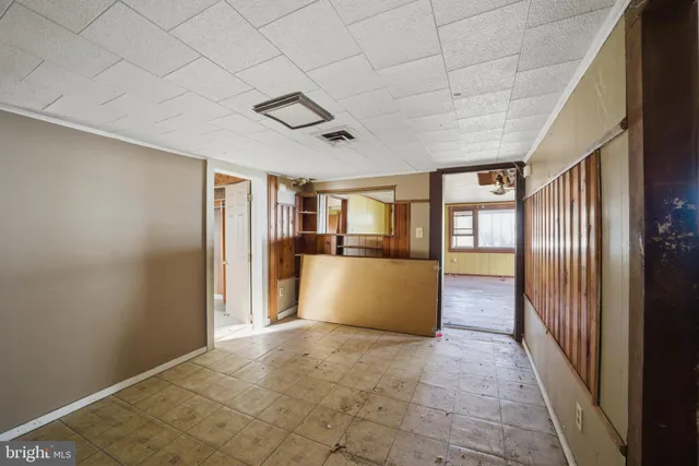 a view of a room with windows