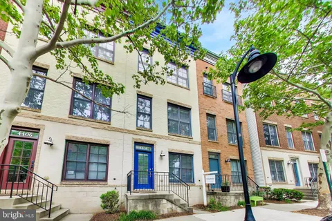 a front view of a multi story residential apartment buildings