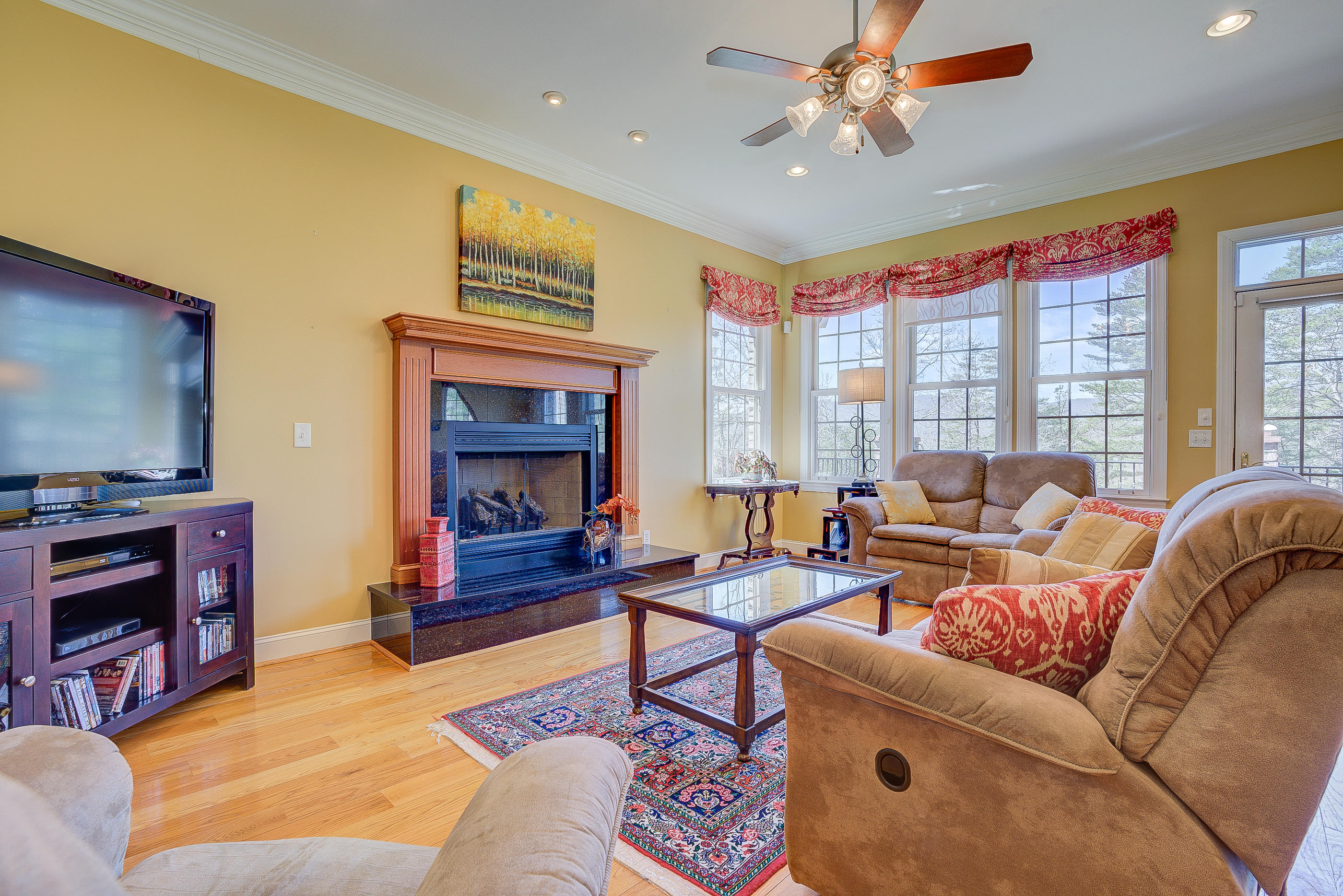 2851 New Ridge Road Elliston, VA 24087 - Photo 11 of 58 a living room with furniture and a flat screen tv