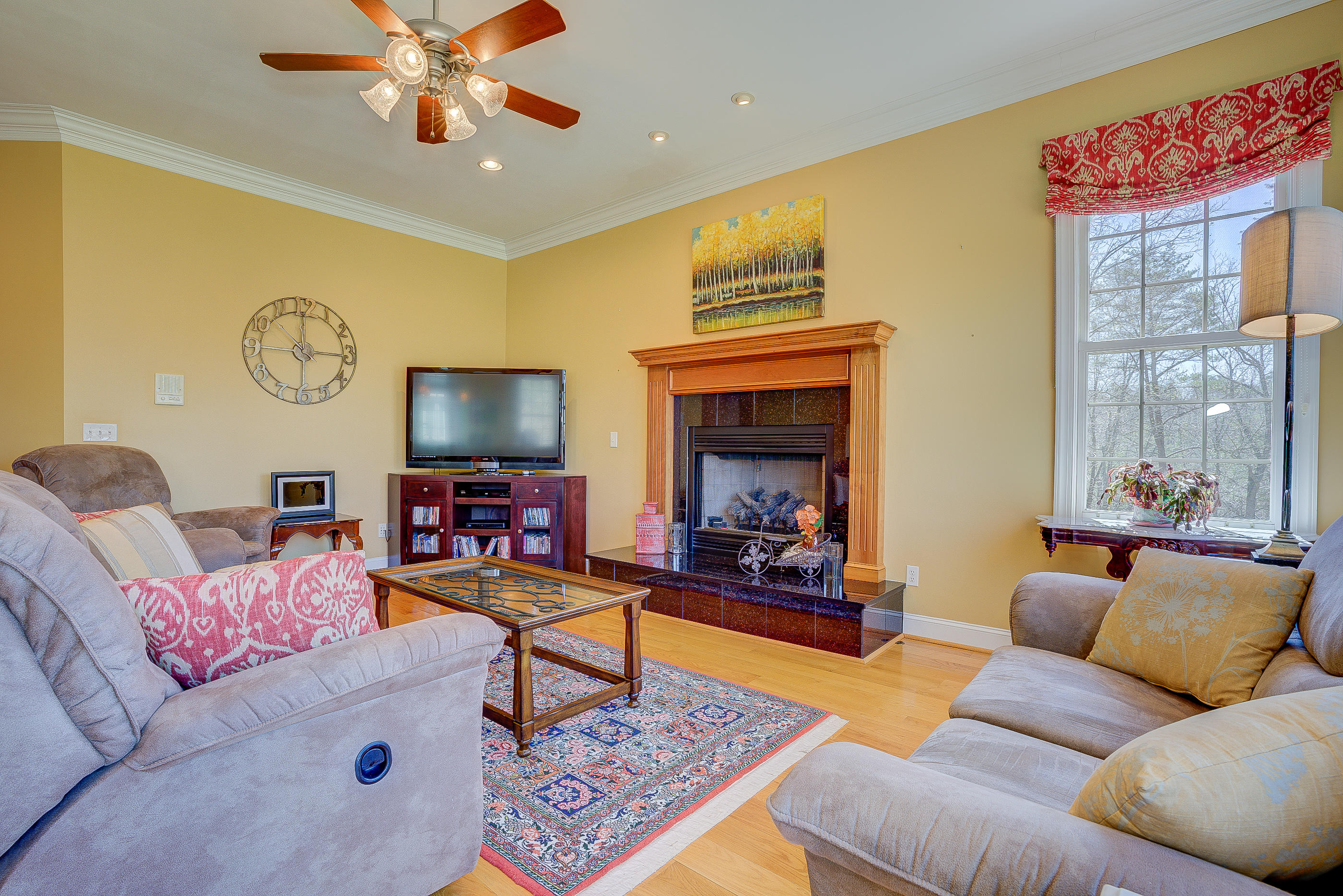 2851 New Ridge Road Elliston, VA 24087 - Photo 12 of 58 a living room with furniture and a flat screen tv