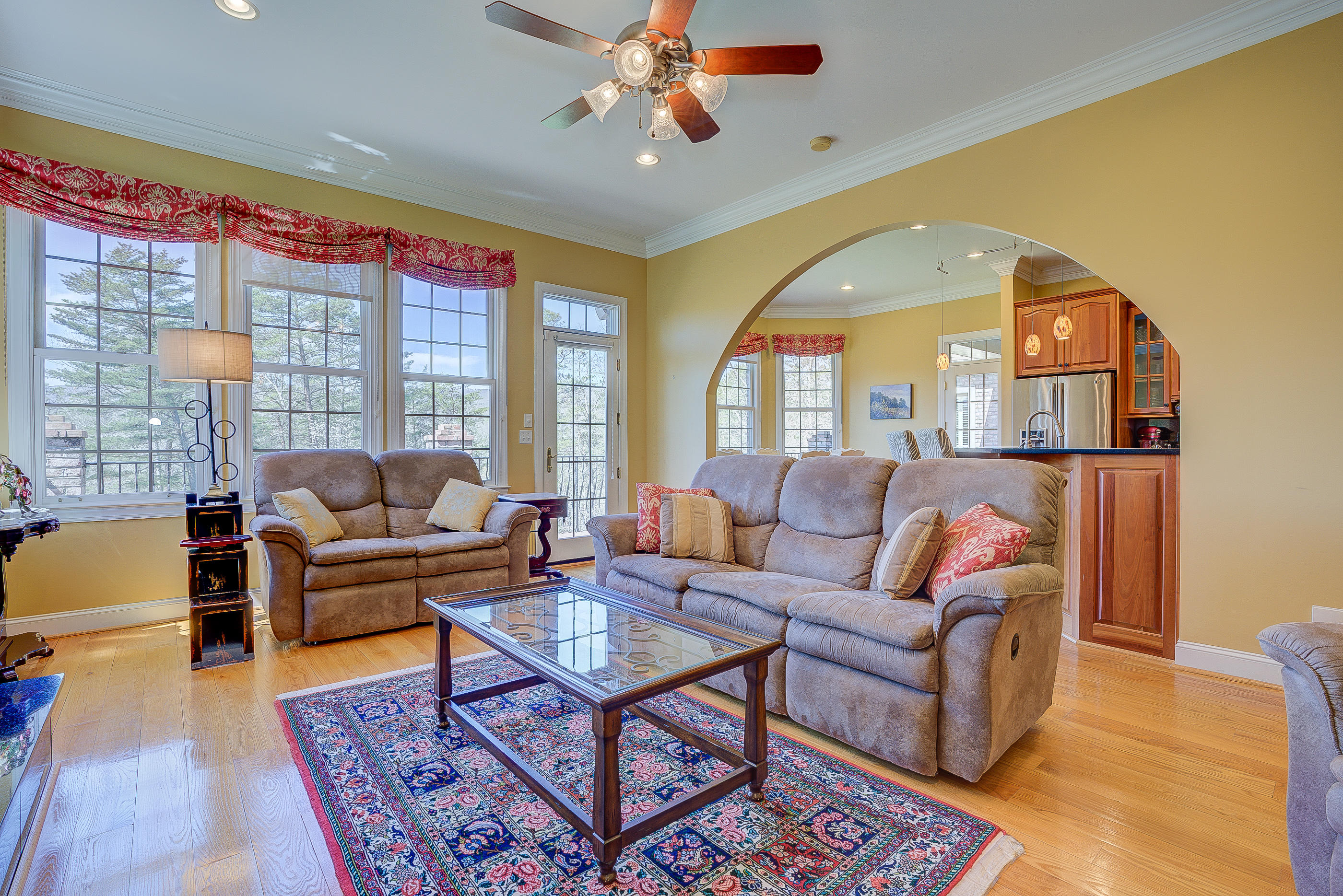 2851 New Ridge Road Elliston, VA 24087 - Photo 13 of 58 a living room with furniture a rug and a chandelier