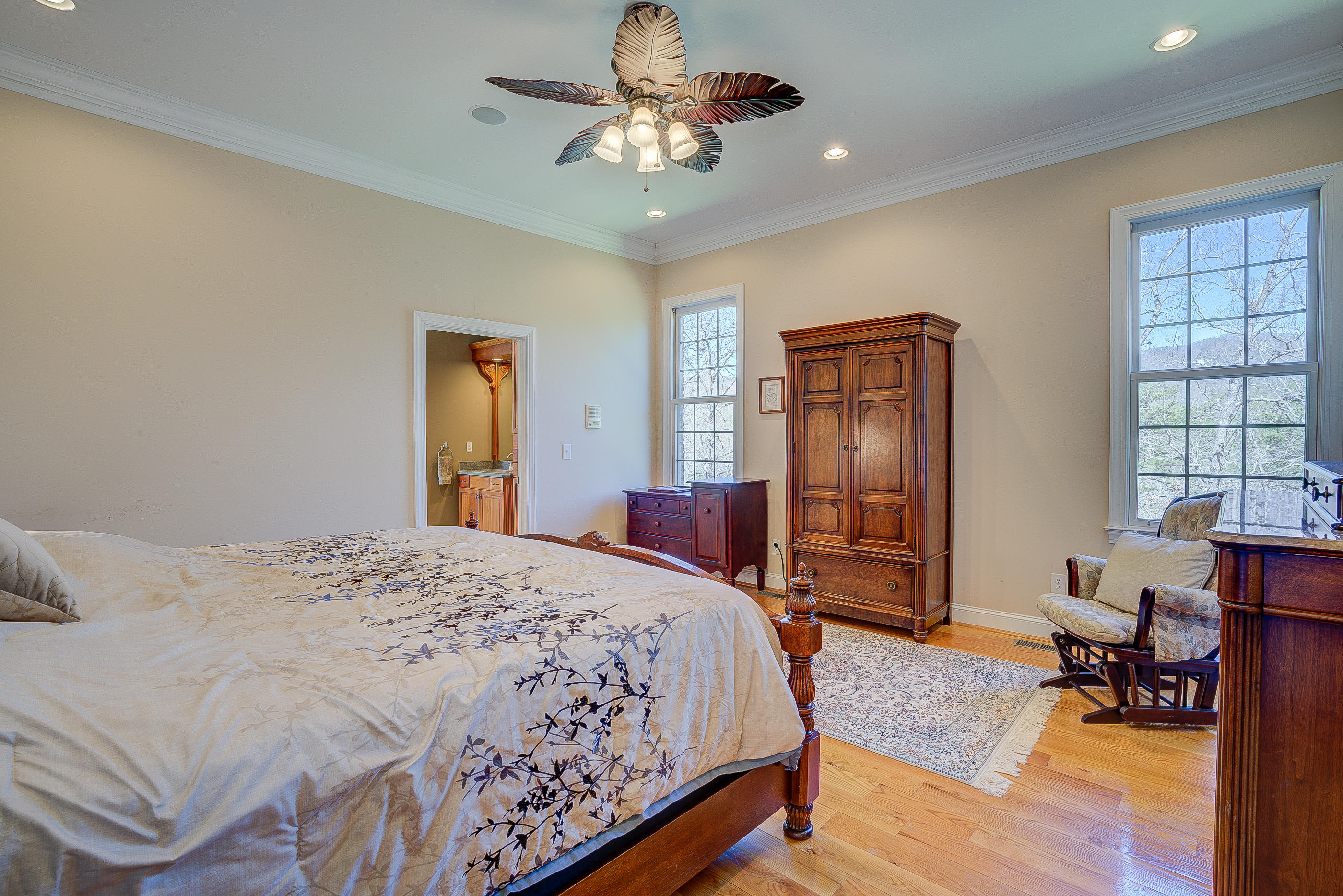 2851 New Ridge Road Elliston, VA 24087 - Photo 25 of 58 a bedroom with a bed and wooden floor