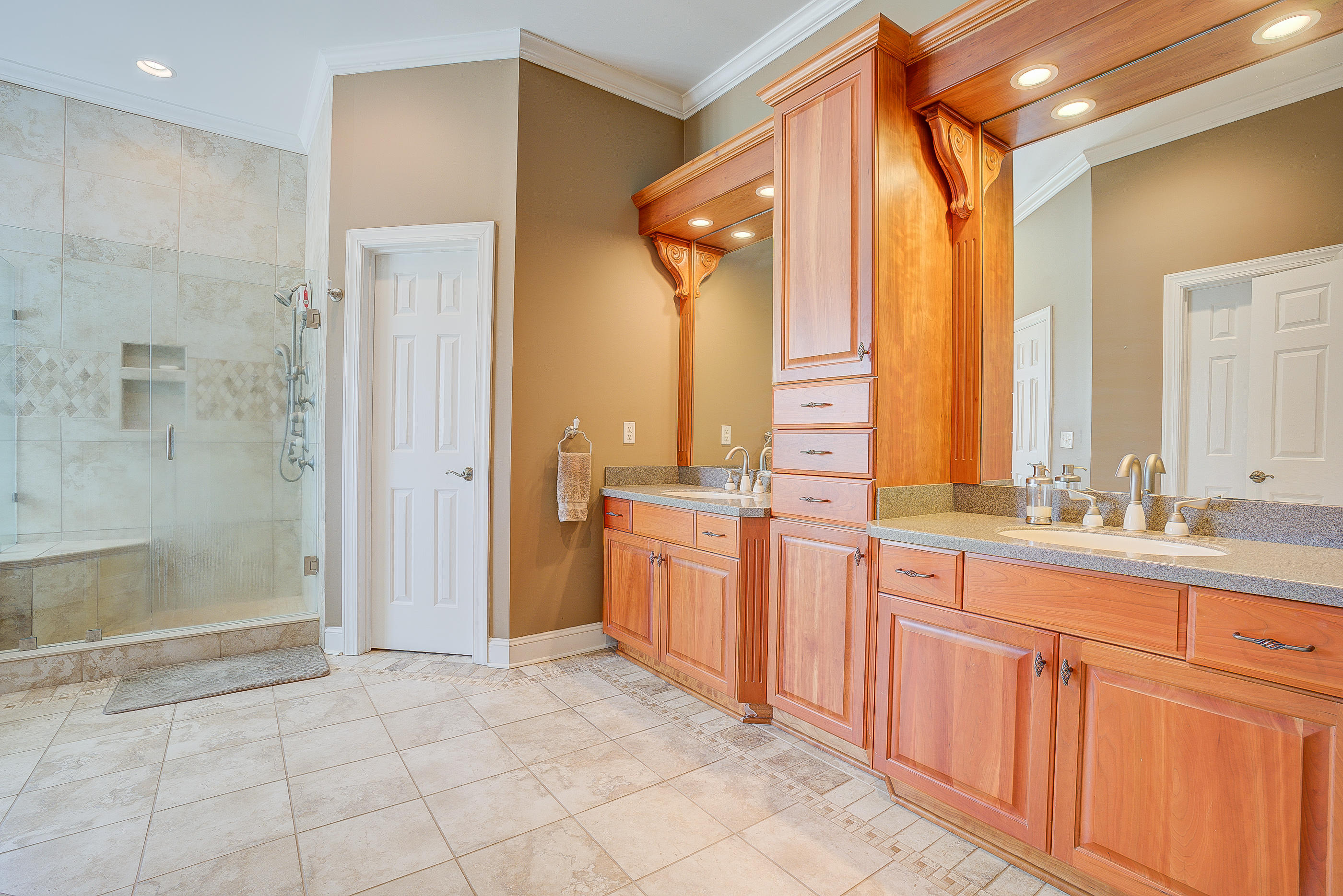 2851 New Ridge Road Elliston, VA 24087 - Photo 27 of 58 a bathroom with a double vanity sink a mirror and a shower