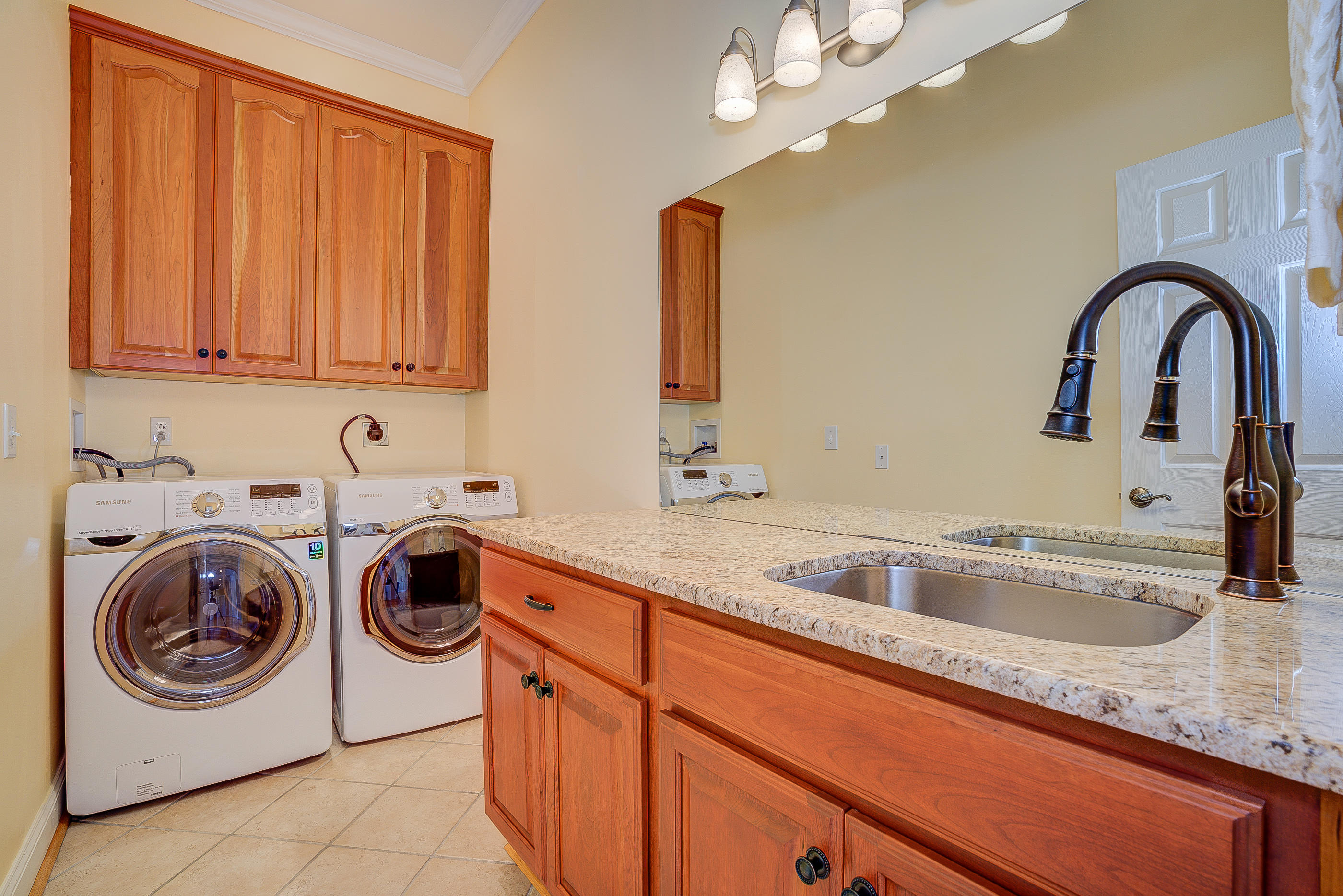 2851 New Ridge Road Elliston, VA 24087 - Photo 29 of 58 a utility room with sink dryer and washer