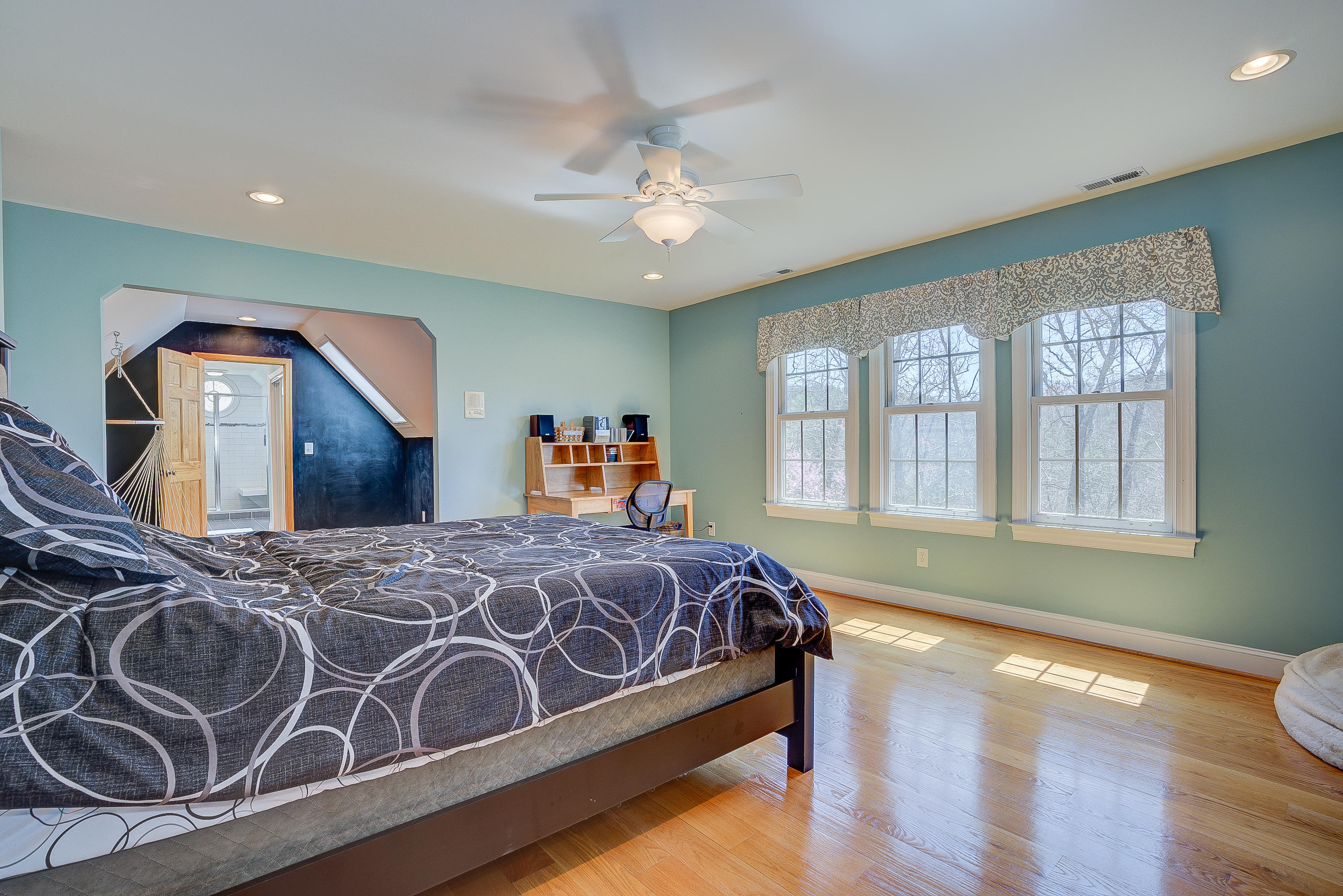 2851 New Ridge Road Elliston, VA 24087 - Photo 41 of 58 a bedroom with a bed next to a window with outer view