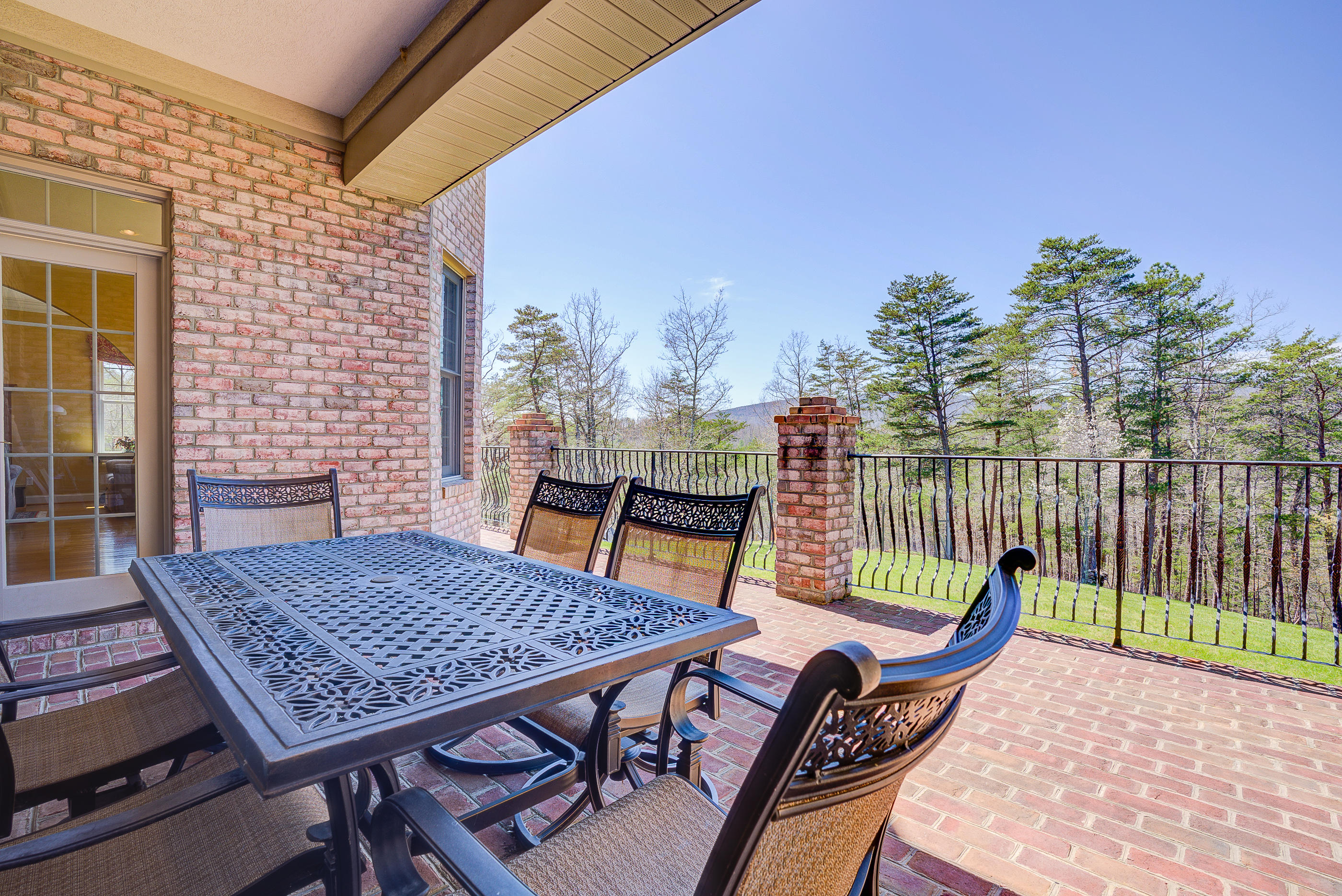 2851 New Ridge Road Elliston, VA 24087 - Photo 46 of 58 a view of a balcony with table and chairs