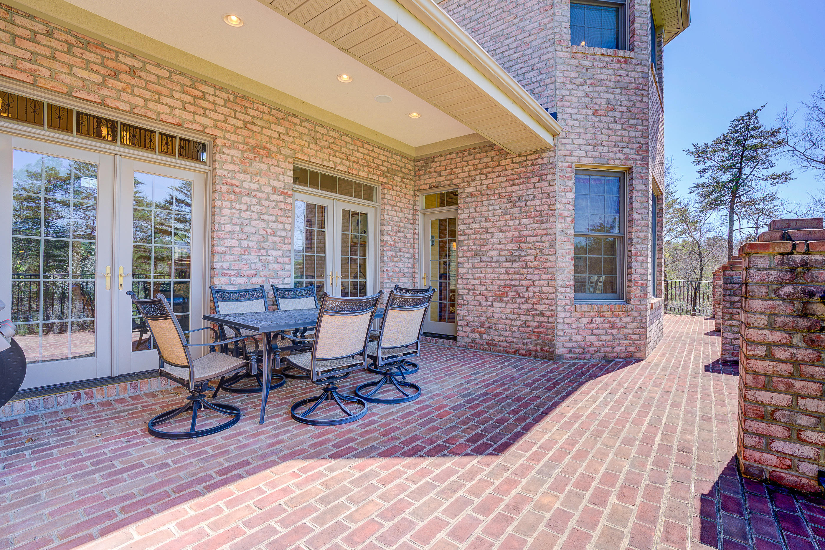 2851 New Ridge Road Elliston, VA 24087 - Photo 47 of 58 a view of a dinning table and chairs in patio of the house