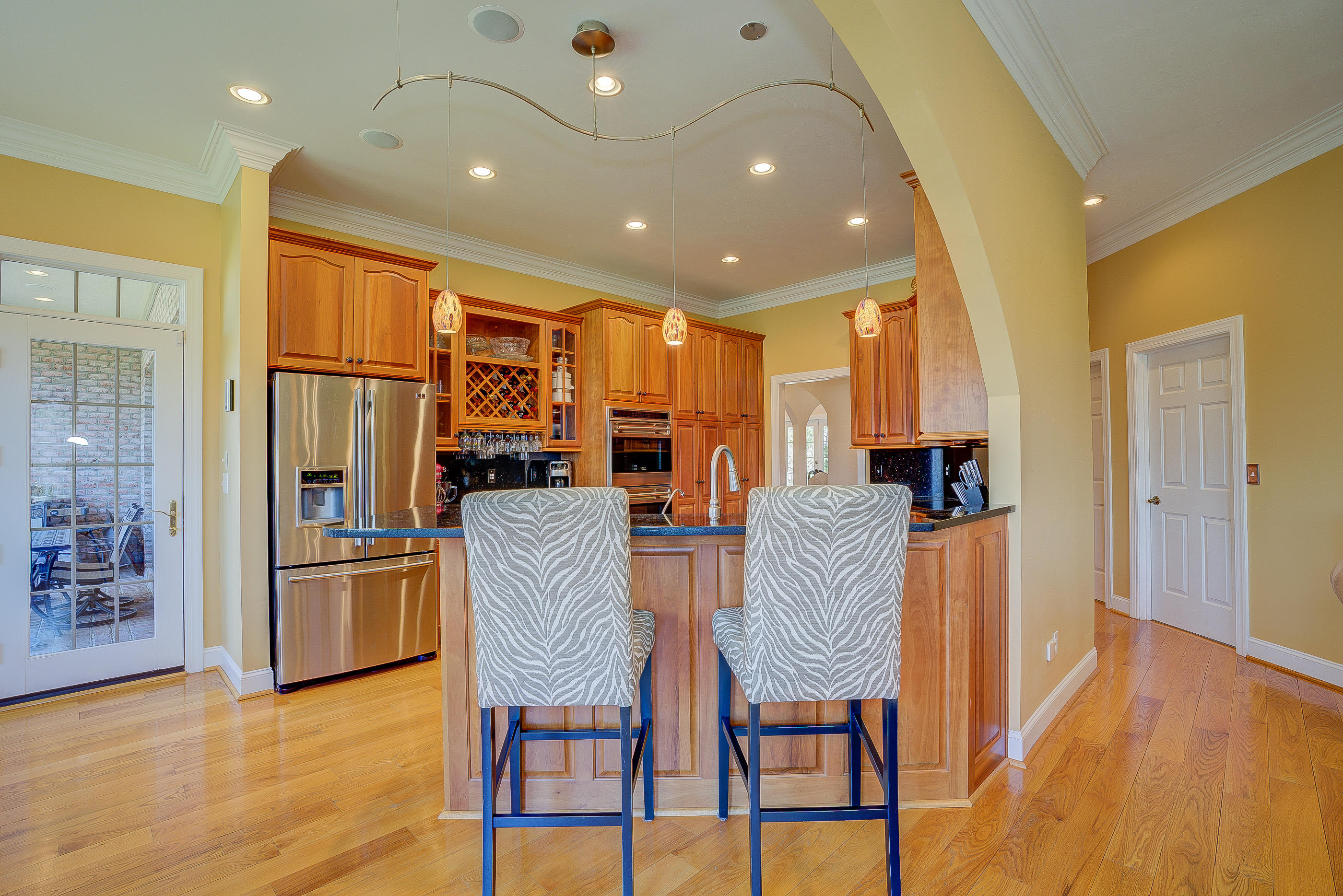 2851 New Ridge Road Elliston, VA 24087 - Photo 9 of 58 a kitchen with stainless steel appliances granite countertop a refrigerator a stove and a dining table with wooden floor