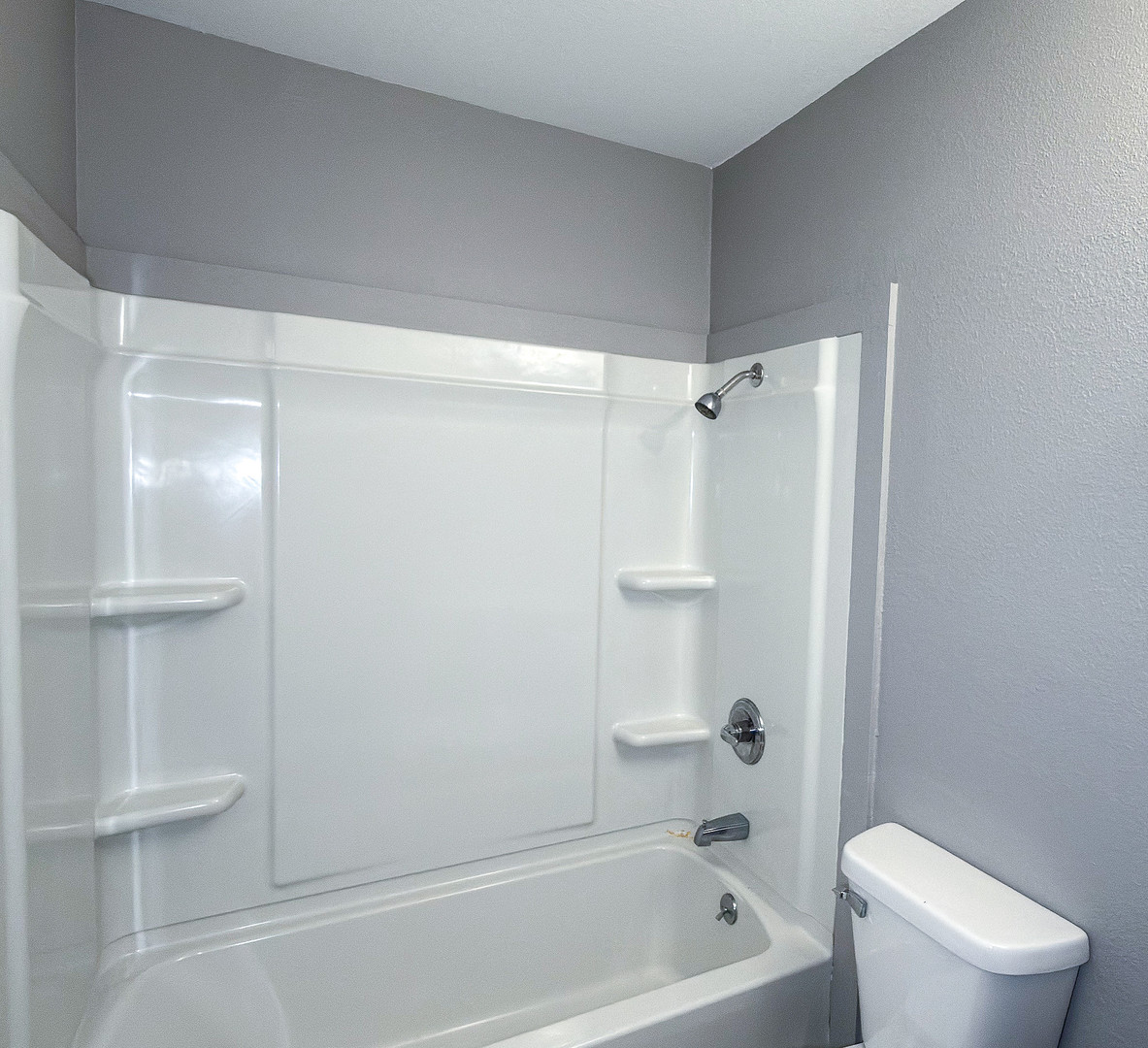 1703 Hedge Road Champaign, IL 61821 - Photo 12 of 17 a bathroom with a shower a toilet and sink